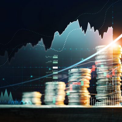 Financial investment concept, Stack of coins for finance investor with  trading graph growth, Stock market, Banking and financial, Digital economy and cryptocurrency on dark background.